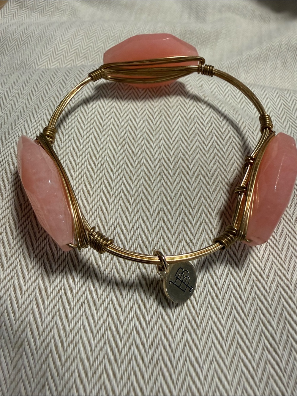 Bourbon and Bowties Gold Wire Bangle with Pink Gemstones